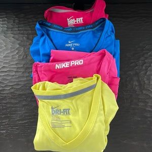 Lot of 4 Nike fitness shirts.